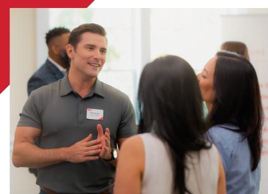 Business professionals building relationships at a networking event.