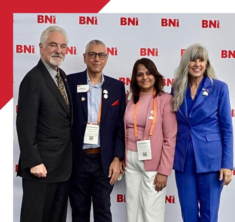 Dr. Ivan Misner, Mary Thompson, and BNI members at a BNI networking event.