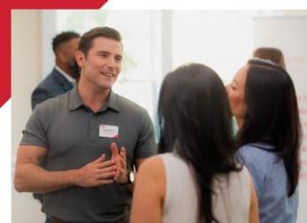 Business professionals building relationships at a networking event.